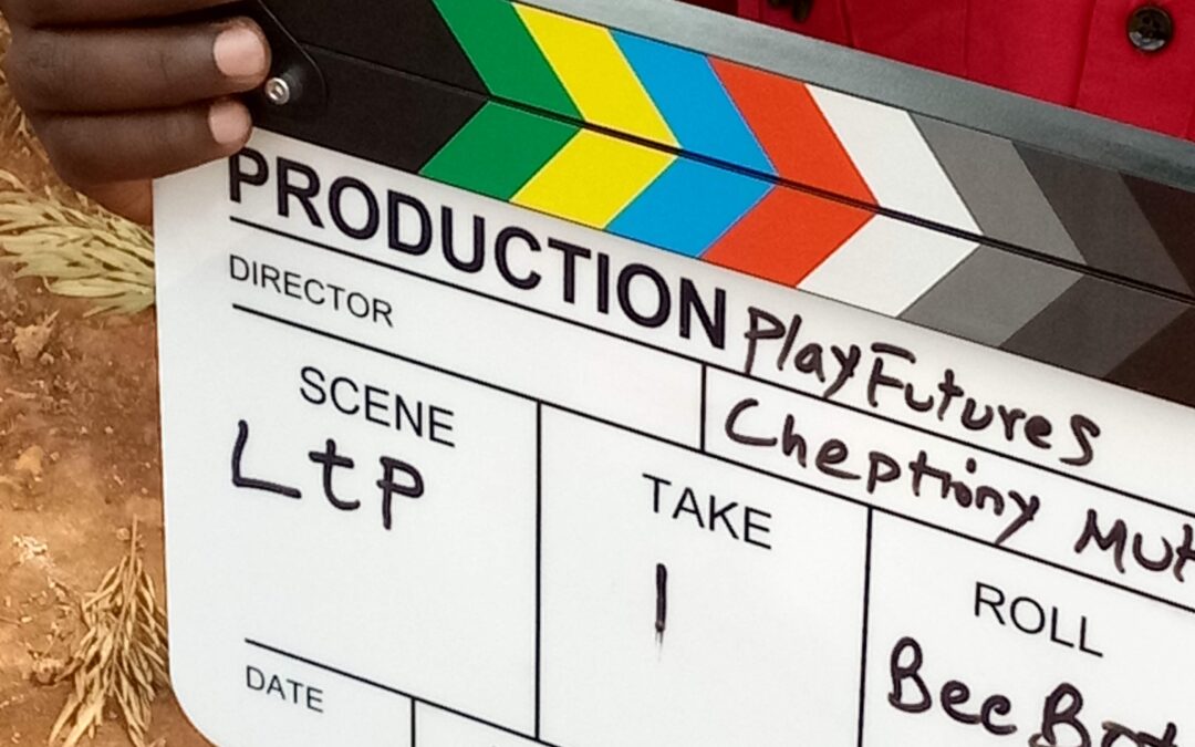 video director holding a clapper